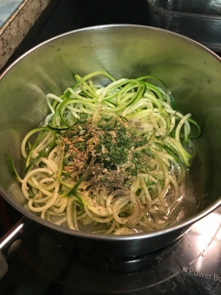A pan with zucchini noodles.