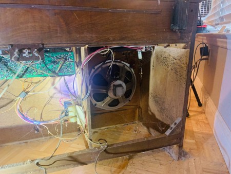 The back of a stereo cabinet.