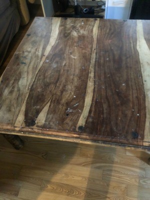The top of a wooden table.