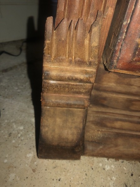 The bottom of an antique dresser.