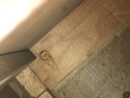 The inside of an antique dresser.