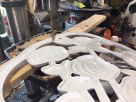 Bug Sculpture - drilling holes in chair back