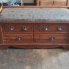 A Murphy hope chest with a padded seat.