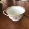 Value of a Set of Noritake Dishes? - tea cup with floral pattern on outside and decorative edge inside