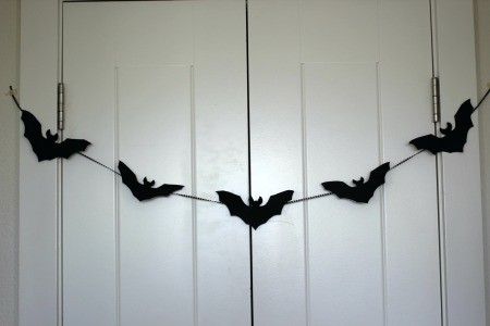 Simple Bat Garland/Bat Wall Decorations - bats strung across folding closet doors