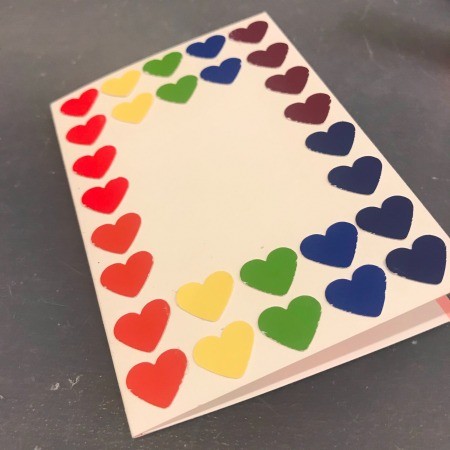 Rainbow Happy Birthday Card - small paper hearts laid out around the outside edges of the card
