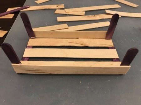 Craft Stick Crate Gift Basket - trace the cut smaller stick and cut 6 more pieces, glue one in each corner as shown