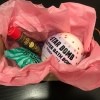 Craft Stick Crate Gift Basket - pink tissue paper and small gifts