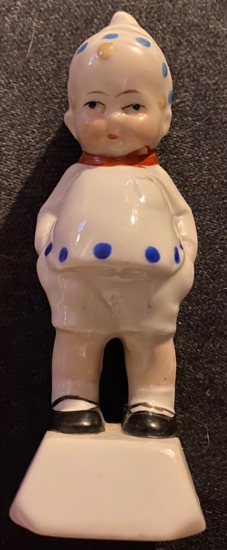 Identifying a Figurine? - vintage figurine of a boy in white, cap, shirt, and shorts