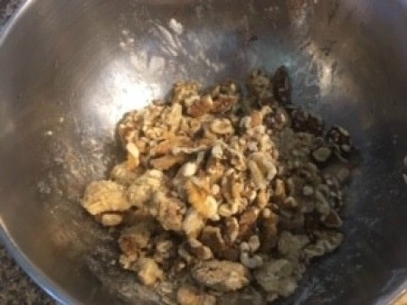 Adding toffee and oatmeal to the apple mixture.