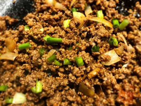 A cooked ground beef mixture.