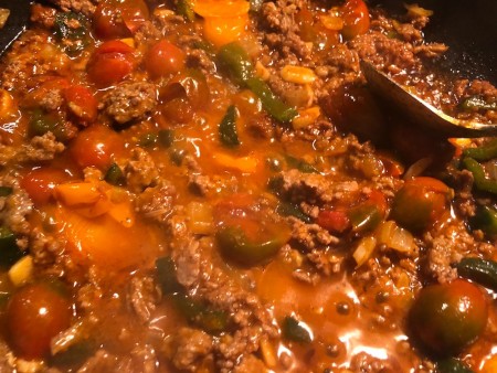 The cooked bolognese sauce in a pan.