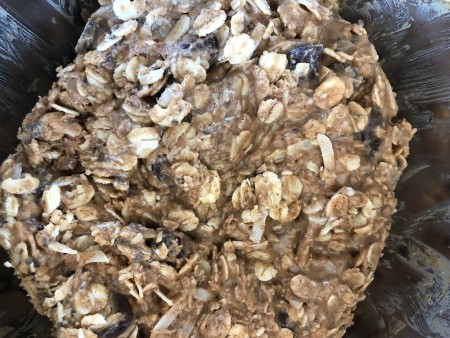 The mixture of almond butter energy bites in a bowl.