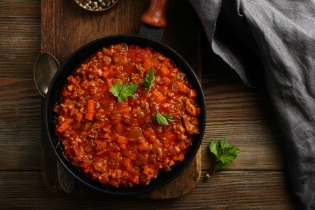 A pan of ground beef bolognese.