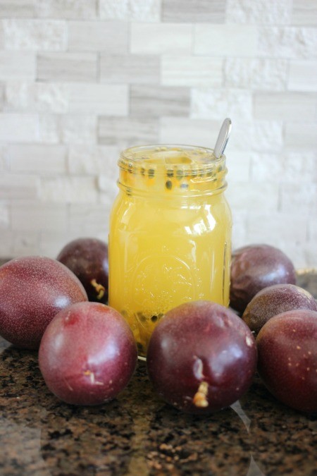 A canning jar of passionfruit iced green tea.