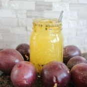 A canning jar of passionfruit iced green tea.