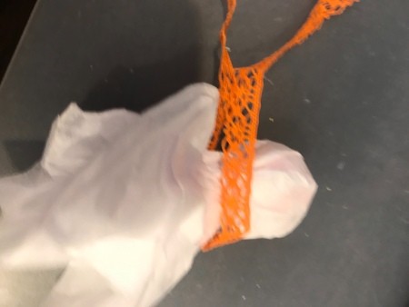 Ghost Candy & Display Stand - tying ribbon around the top of the stick to make the ghost