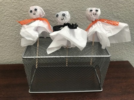 Ghost Candy & Display Stand - ghosts stuck through the bottom of the container