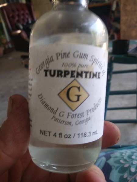 A bottle of turpentine.