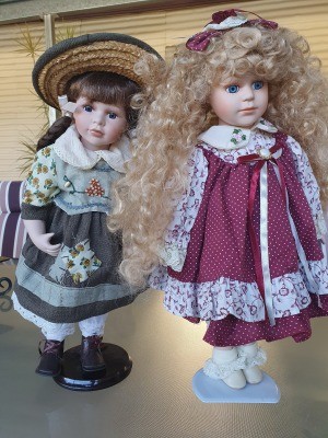 Identifying Porcelain Dolls? - two girl dolls in longish dresses
