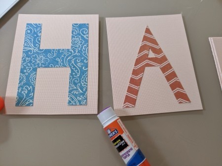 Happy Birthday Cut Letter Banner - gluing letters to the rectangles