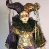 Information on a Brinn Porcelain Musical Jester?  - black, gold, and purple jester doll