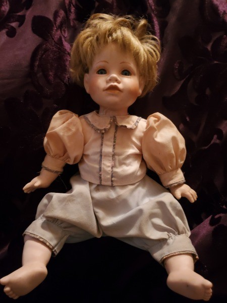 Identifying a Porcelain Doll? - doll sitting