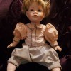 Identifying a Porcelain Doll? - doll sitting