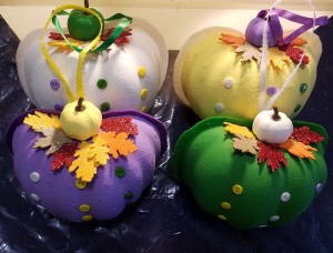 Non-Traditional Foam Pumpkin Halves - the finished pumpkins with ribbon hangers attached, ready to hang