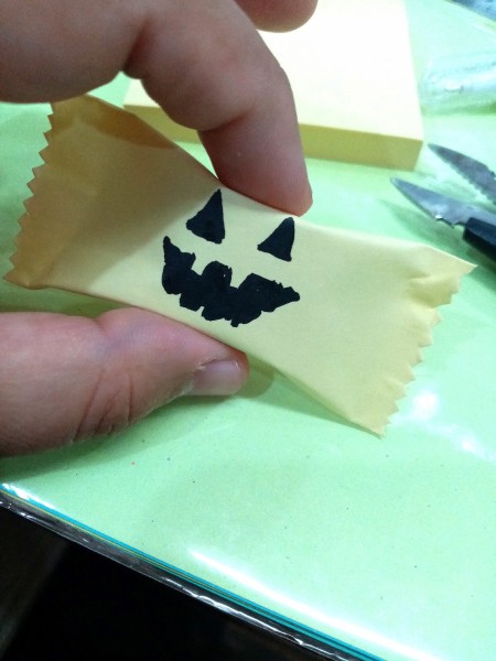 Trick or Treat Candy Surprise Paper Wraps - squeeze the wrap between your fingers to puff up