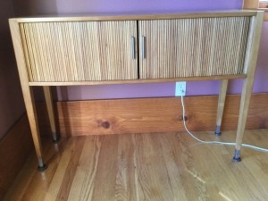 A wooden sideboard.