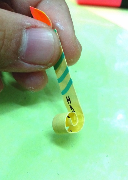 Birthday Cake Gift Box - curl the bottom of the candle strip