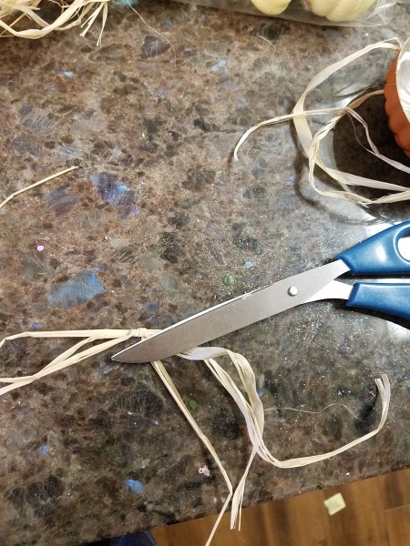 Mini Baking Tin Pumpkins - cutting raffia