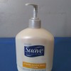 A bottle of lotion with a pump.
