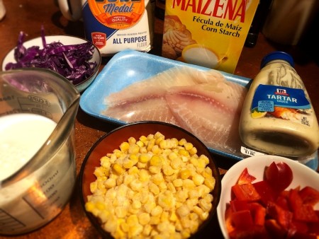 The ingredients for battered fish tacos with fresh slaw.
