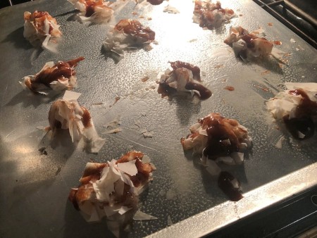 Phyllo dough with a cinnamon sugar mixture on a cookie sheet.