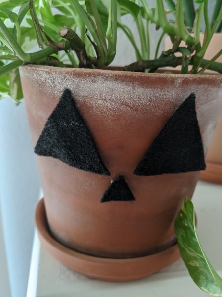 Halloween Pumpkin Planter - partially decorated planter