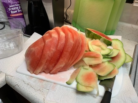 The watermelon with the rind removed.