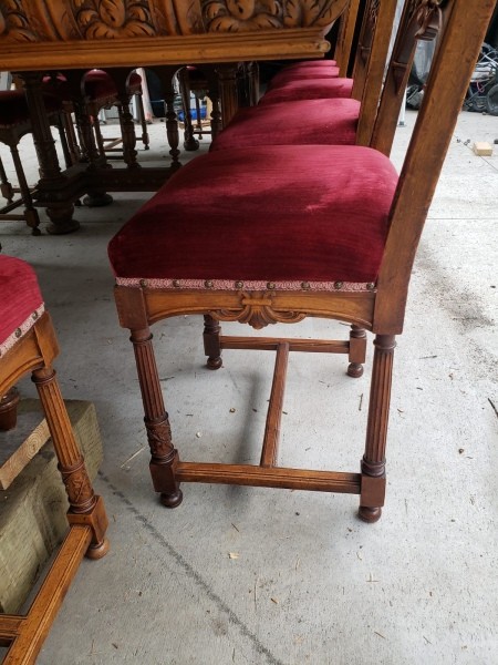 Red seated dining chairs.