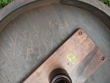 The bottom of a wooden table.