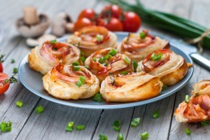 A plate of homemade pizza rolls.