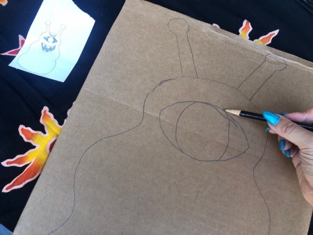 Cardboard Window Monster - draw monster onto the cardboard