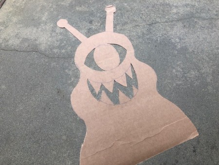 Cardboard Window Monster - tidy up the cut edges with scissors as needed