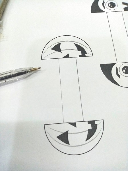 Paper Monster Rings - draw half a face on each half circle