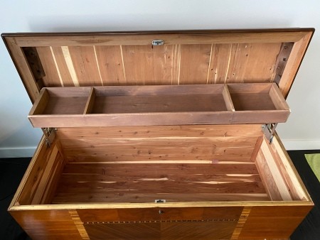 The inside of a cedar hope chest.