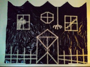 Big Garbage Bag Hanging Haunted House - finished house complete with picket fence and spider hanging down