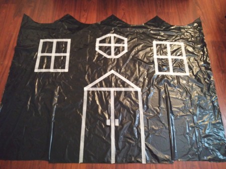 Big Garbage Bag Hanging Haunted House - peak over the door
