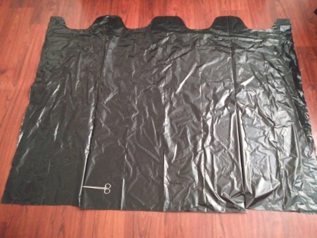 Big Garbage Bag Hanging Haunted House - cut across the bottom and open up