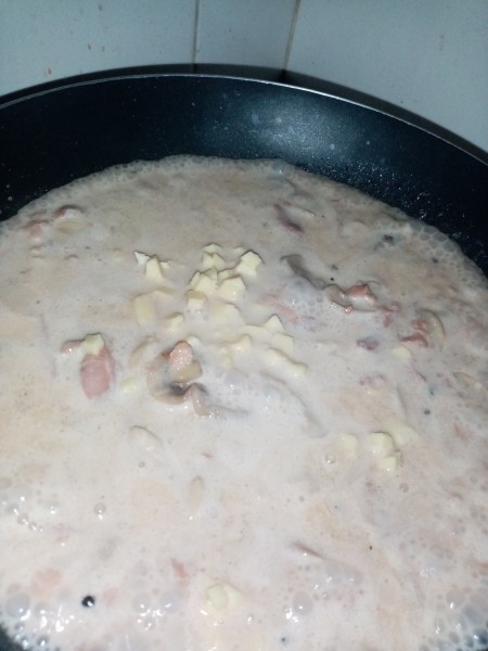 Thickening the mixture in a frying pan.