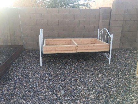 Garden Bed from Recyled Bed Frame  - frame placed on top of the bed rails